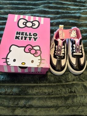 Hello Kitty Black, Pink and White Girls' Slip-On Sneakers with Bows